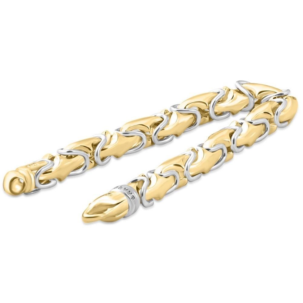 This stunning men's bracelet is made of solid 14k white and yellow gold.  The bracelet weighs 74 grams and measures 8.5