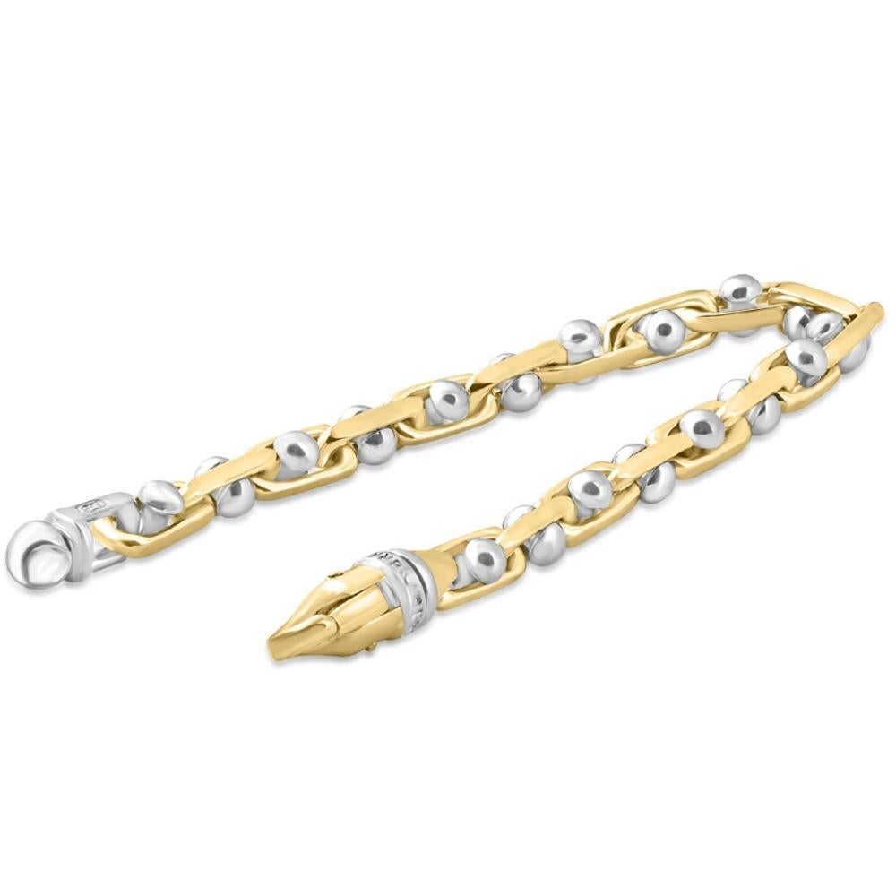 Ce superbe bracelet pour homme est en or jaune et blanc 14k massif.  Le bracelet pèse 52,80 grammes et mesure 8,5 pouces.  La pièce est dotée d'un fermoir en forme de homard durable. #B-3110