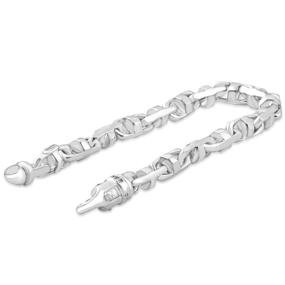 This stunning men's bracelet is made of solid 14k white gold.  The bracelet weighs 46.50 grams and measures 8.5