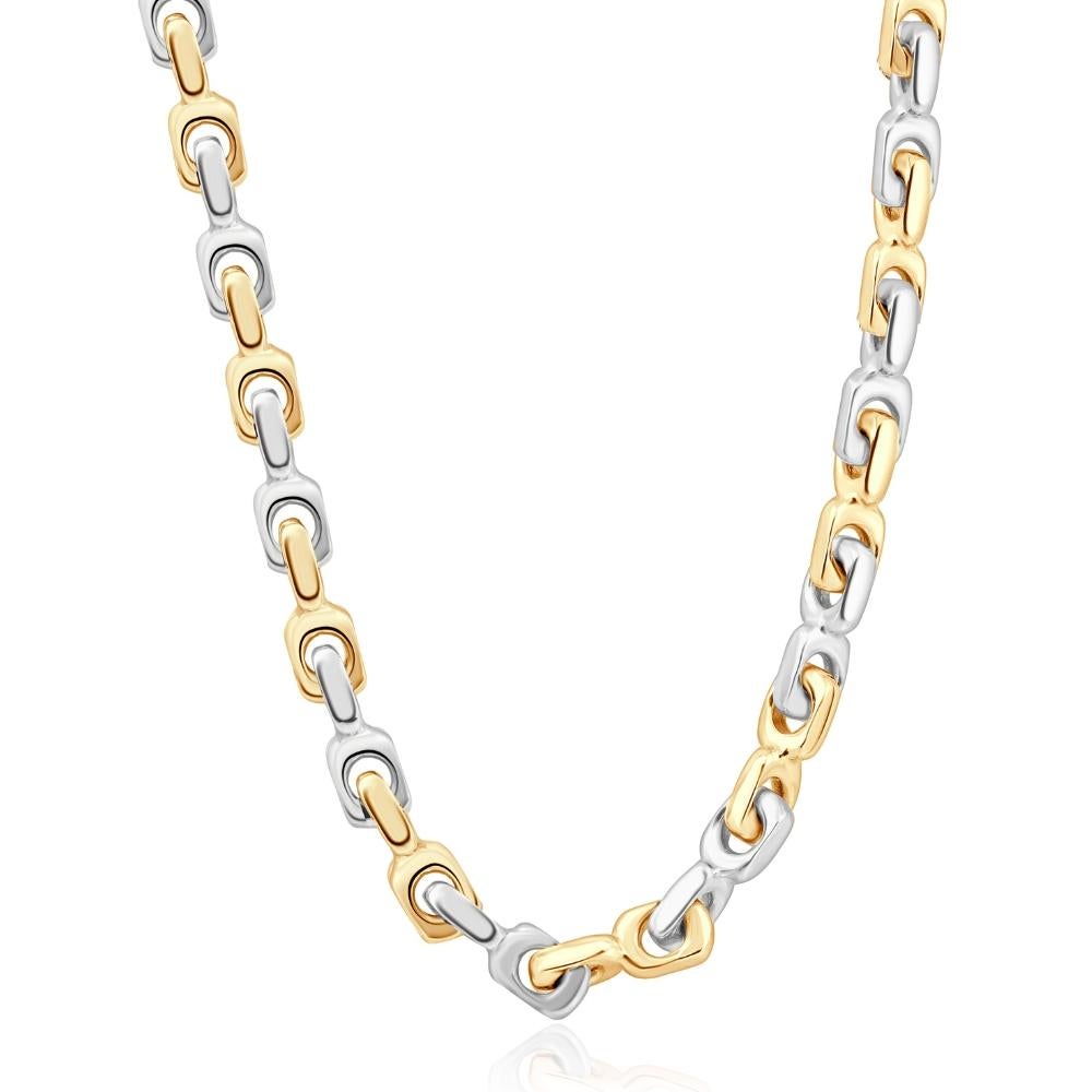 This stunning men's chain necklace is made of solid 14k yellow/white gold.  The necklace weighs 182 grams and measures 23