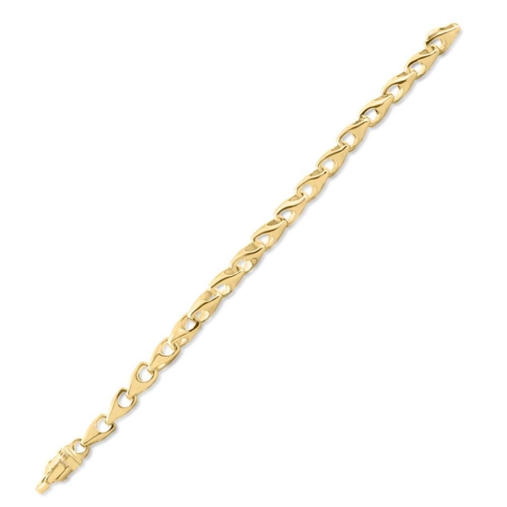 Ce magnifique bracelet pour homme est en or jaune/blanc massif 14k.  Le bracelet pèse 48 grammes et mesure 8,5 pouces.  La pièce est dotée d'un fermoir en forme de homard durable. 
B-3311y