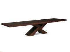 Brace Dining Table with Sculptural Table Base Shown in Chestnut Brown Mahogany