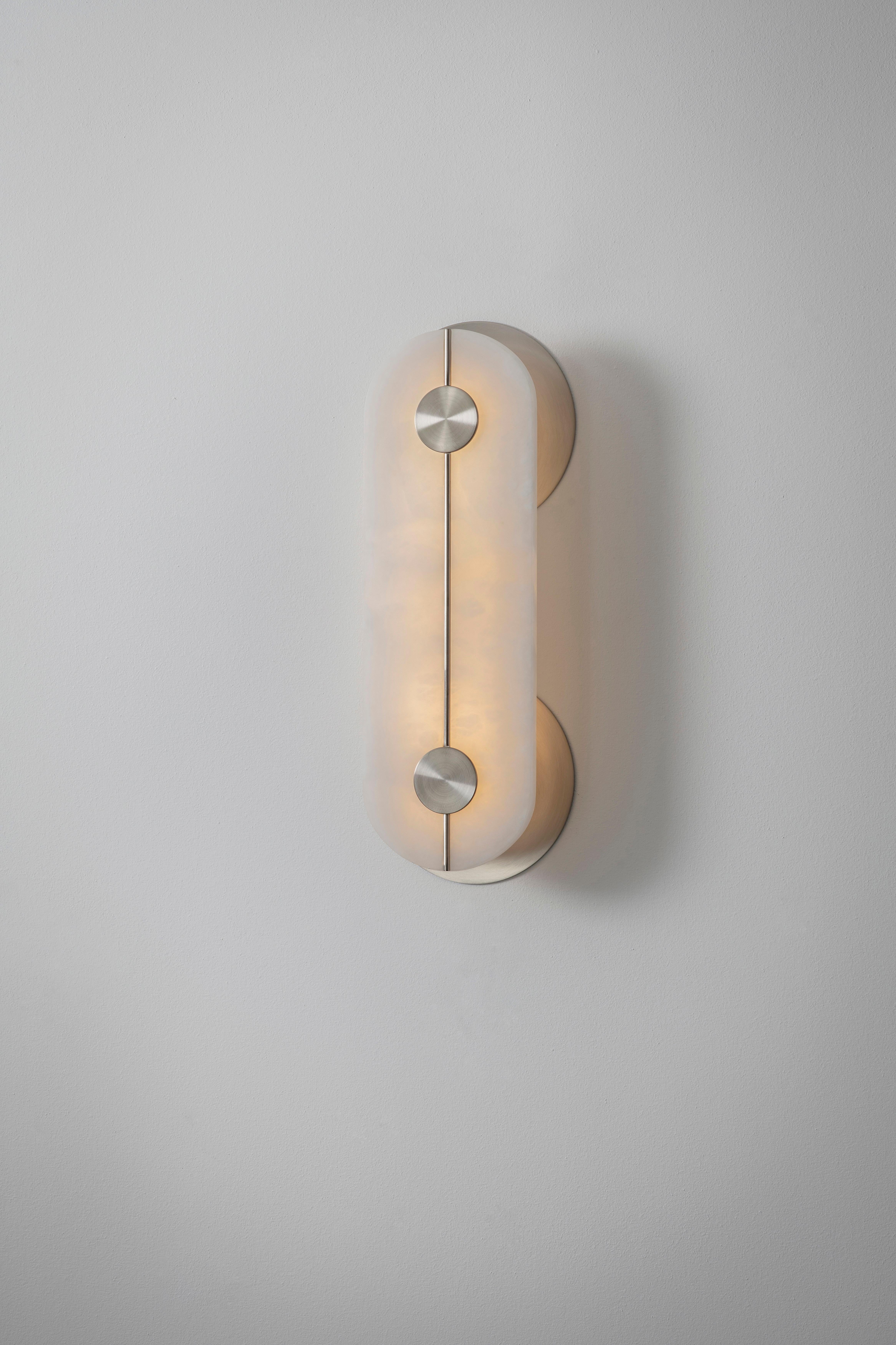 Brace wall light nickel large by Bert Frank
Dimensions: 7 x 24 x H 64 cm 
Materials: Nickel, Alabaster


All our lamps can be wired according to each country. If sold to the USA it will be wired for the USA for instance.

When Adam Yeats and