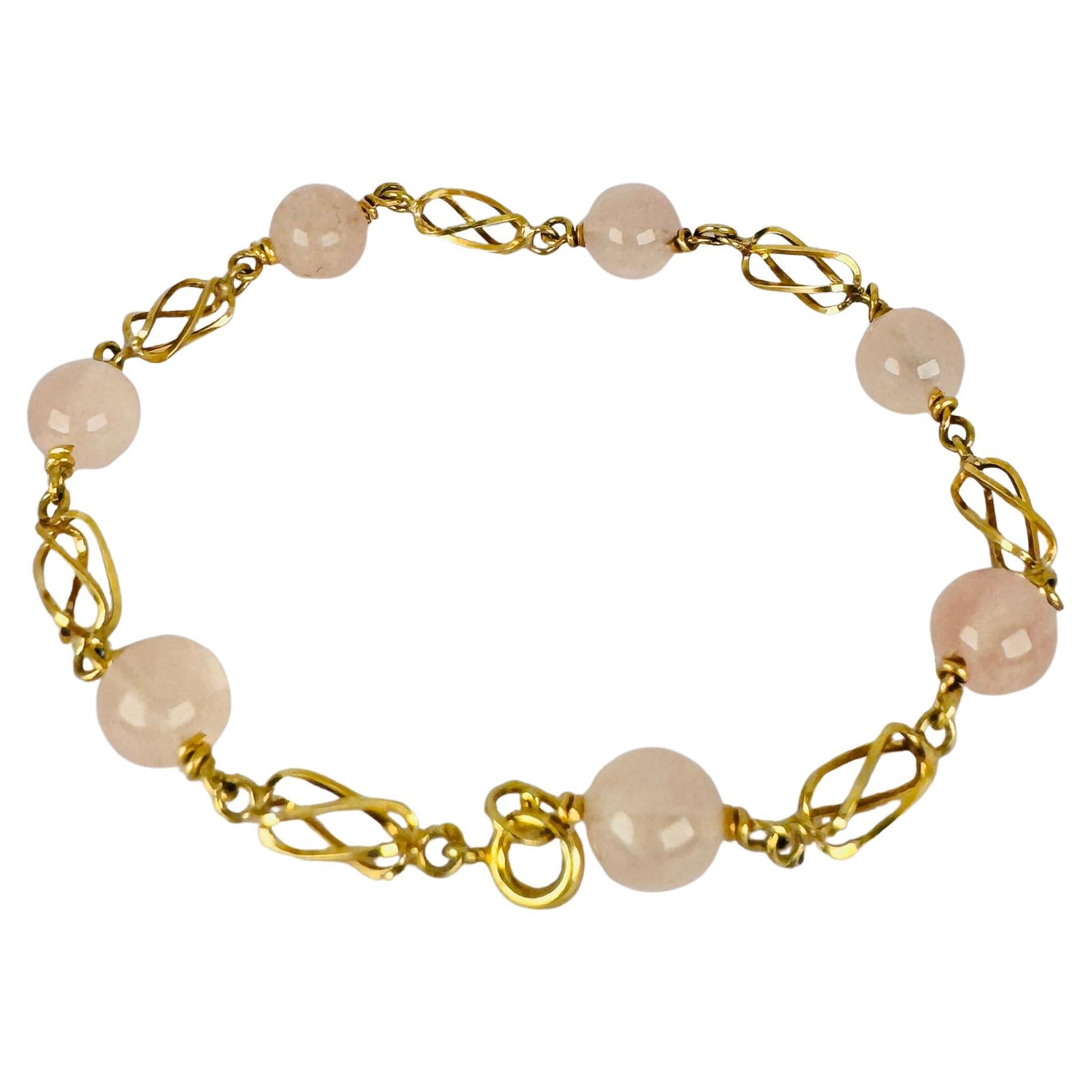 Bracciale 14k giallo con catena a catena con quarti di rosa in vendita