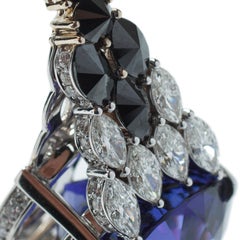 Tanzanite 49, 46ct & Diamonds 15, 65ct 18k Gold Bracelet