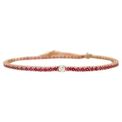 Bracelet en or 18 carats, rubis 1,45 carats et diamants au centre  Tennis 0,11 carat