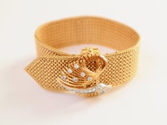Bracelet 1950 Belt Motif in 18 Karat Yellow Gold and Platinum Bangle