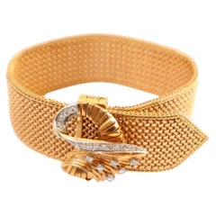 Bracelet 1950 Belt Motif in 18 Karat Yellow Gold and Platinum Bangle