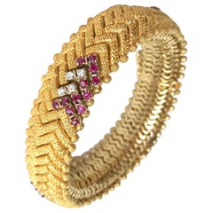 Retro Bracelet c1960 in 18 Karat Yellow Gold Diamonds and Ruby Hammered Satin-Brushed 