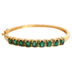 Bracelet 9 Emeralds Approximate 3 Carat in 14 Karat Yellow Gold Setting