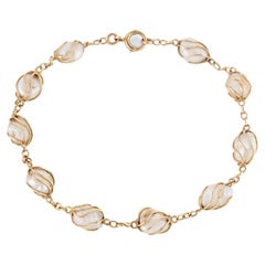 Bracelet ancien ou et perles de culture baroques