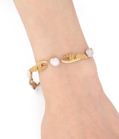 Bracelet Art nouveau à décor de gingko biloba en or et perles