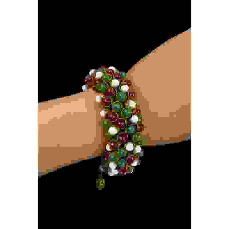 ANONYMOUS - Bracelet in golden metal and glass beads. Jewelry of the 60's unsigned, attributed to Lola Prussac

Additional information:
Condition: Very good condition
Dimensions: Length: 18 cm
Period: 20th Century

Seller Reference: BRA88