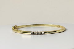 Bracelet bangle 14 carat yellow gold  5 brilliant cut diamonds of 0.25 carat