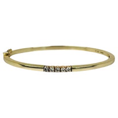 Bracelet bangle 14 carat yellow gold  5 brilliant cut diamonds of 0.25 carat