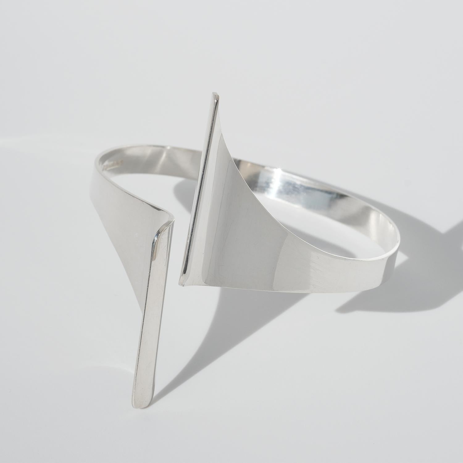 This sterling silver cuff bracelet is fixed and has an assymetric shape.

The bracelet has a classic as well as a timeless look and it will fit perfectly for the business meeting as well as the rave party.

Did you know that Pekka Piekäinen designed