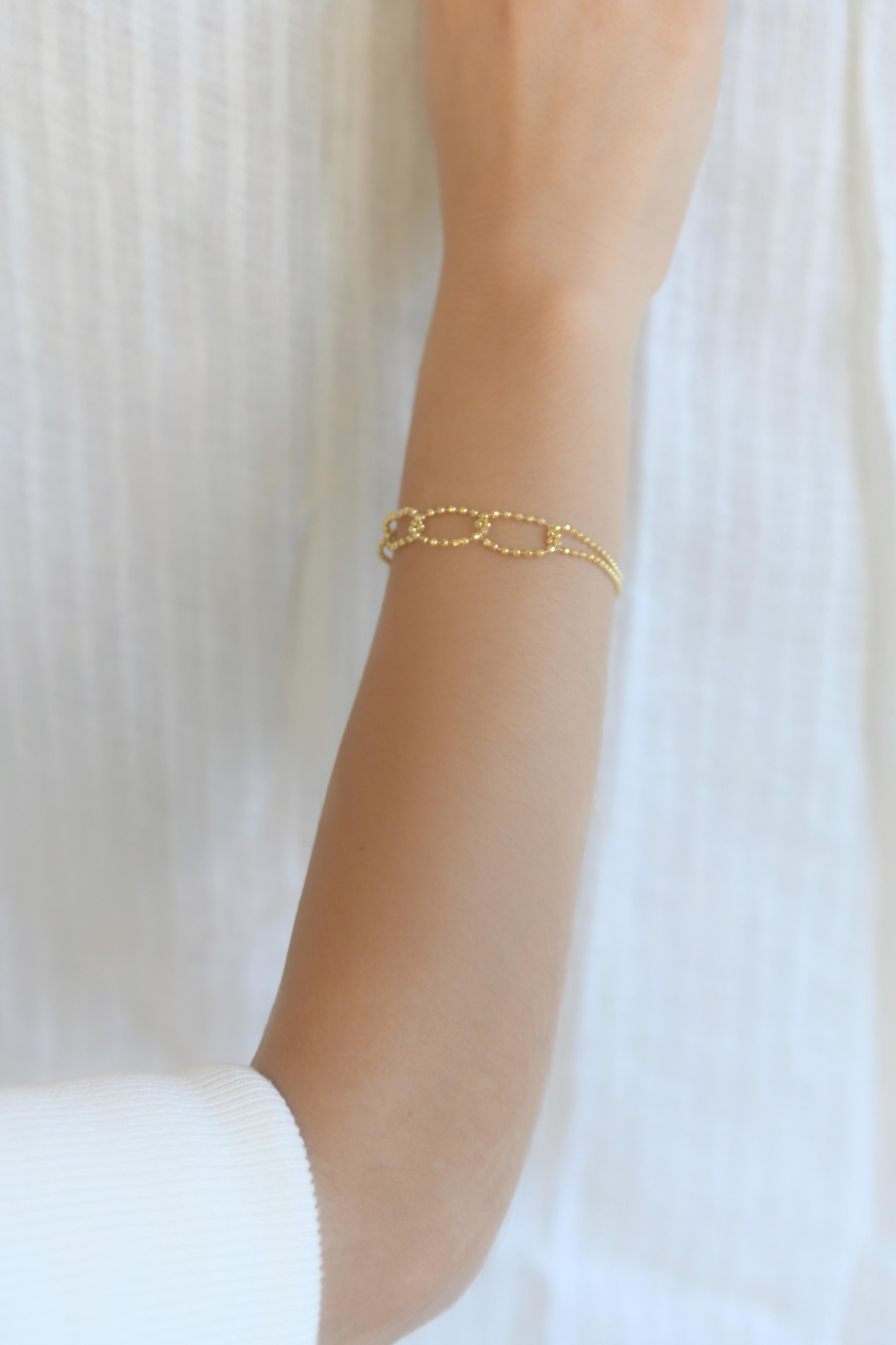 Honeycomb bracelet

Gold plated, lightweight bracelet featuring links that are made of a delicate sterling silver beaded chain. The chain reflects light to make your face glow up. Hand-crafted by local skilled Greek craftsmen.

follow us on