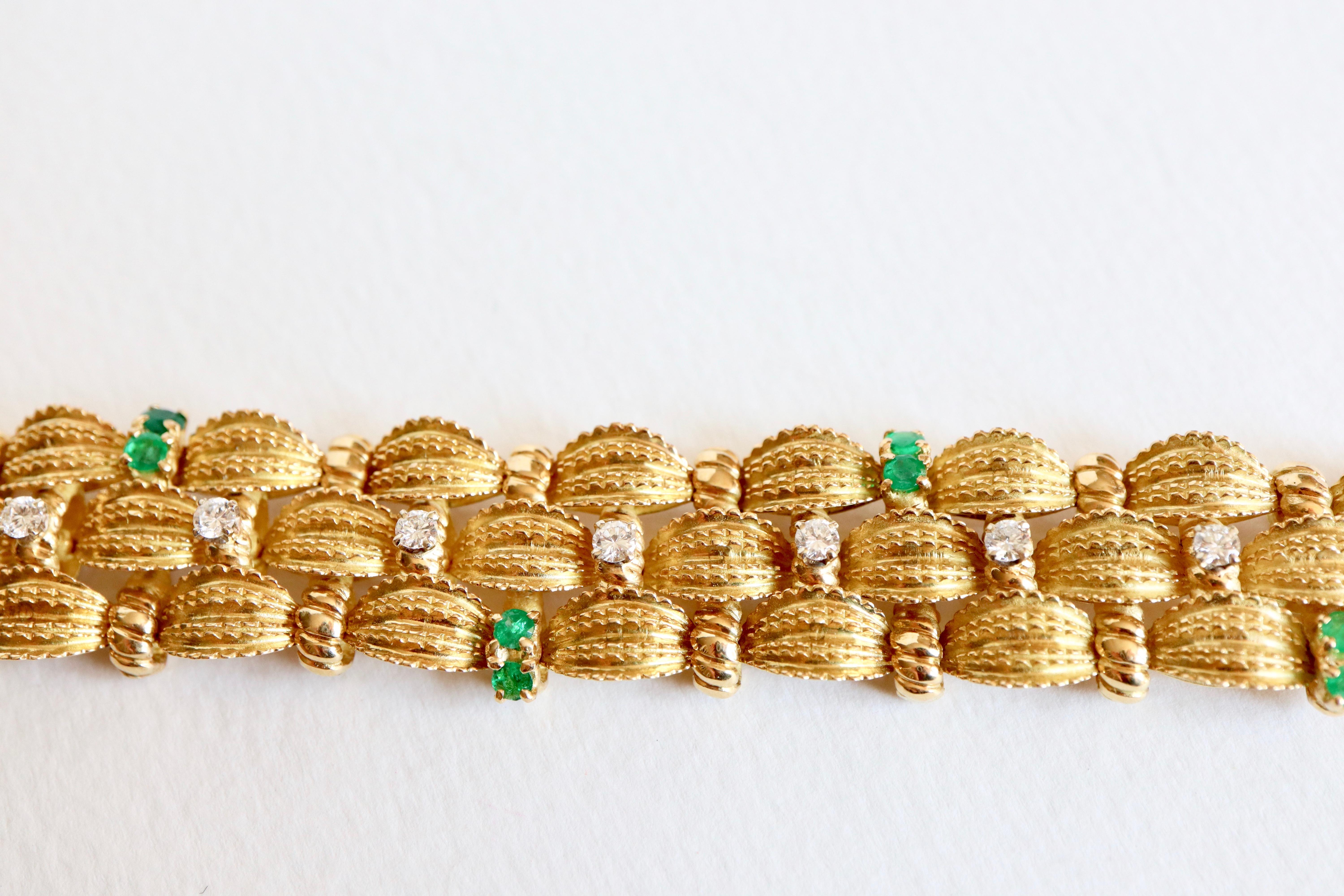 Brilliant Cut Bracelet circa 1960 Articulated in 18 Karat Yellow Gold Diamonds and Emeralds