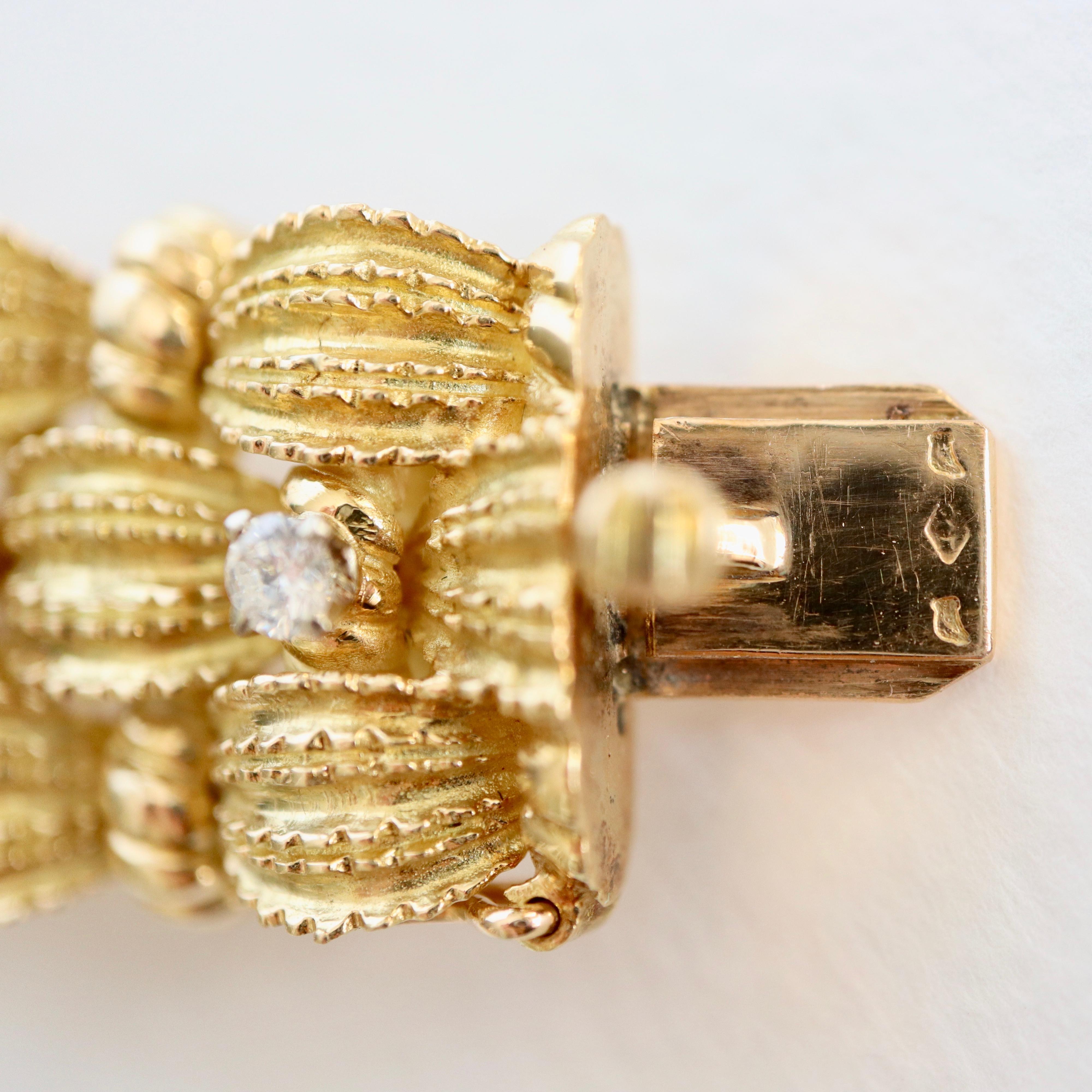 Bracelet circa 1960 Articulated in 18 Karat Yellow Gold Diamonds and Emeralds 1