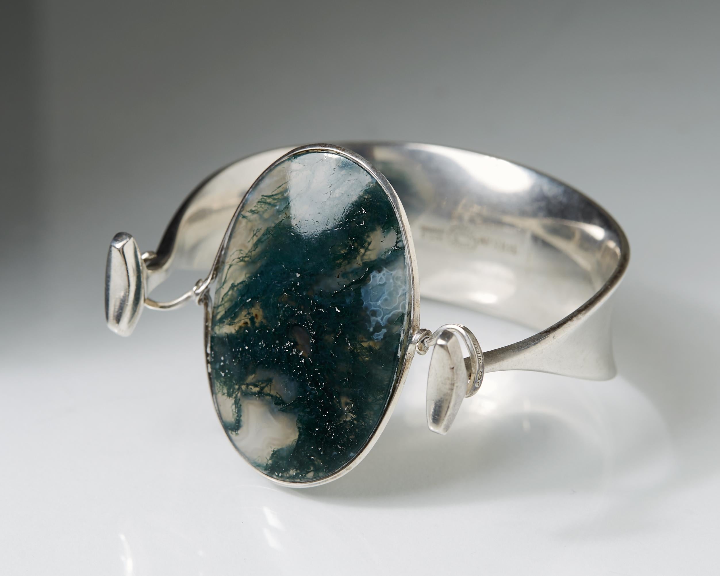 Sterling silver and moss agate.