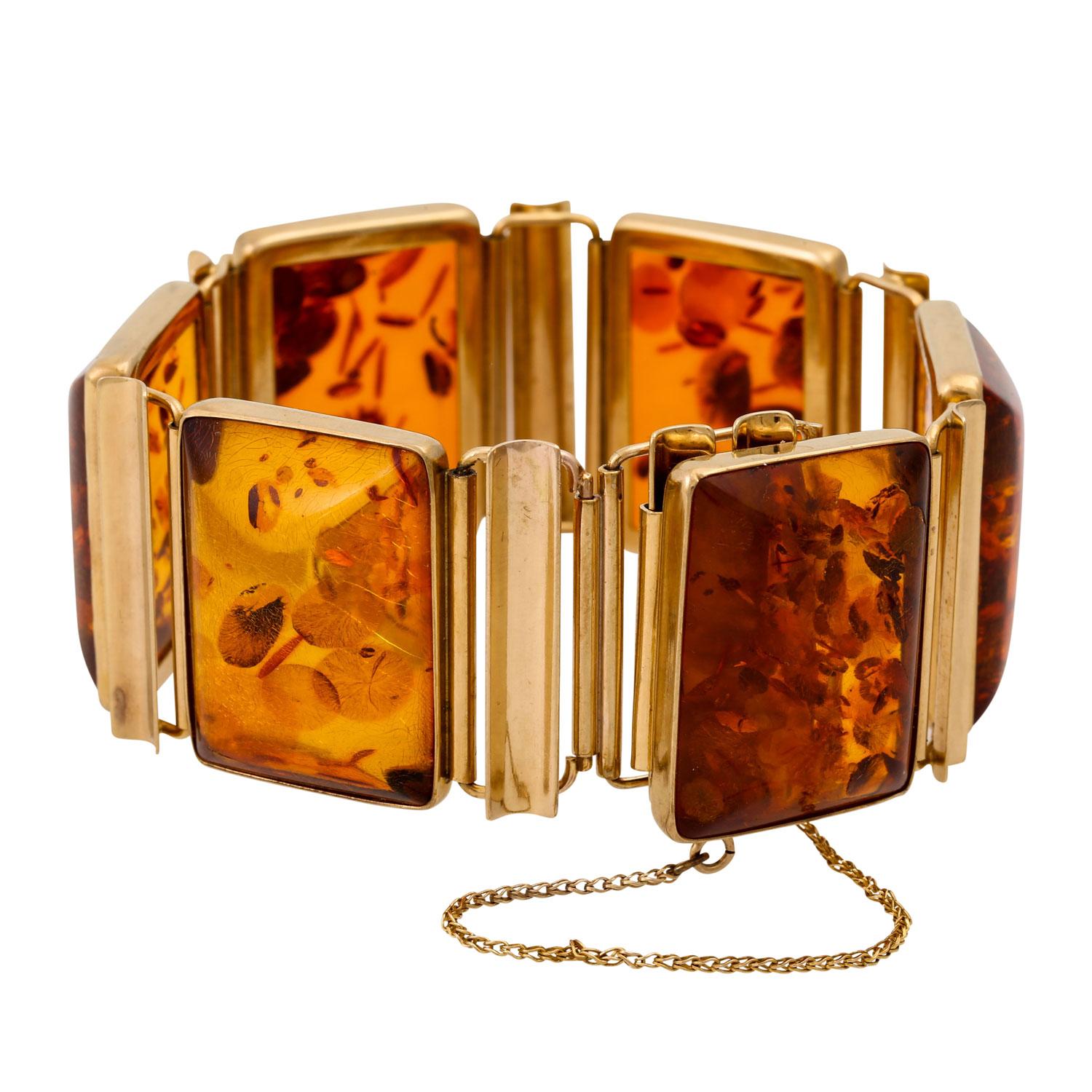 Armband, insb. mit 6 bernsteinfarbenen Cab. GG 8K L.: ca. 19,5 cm. x B: 2,8cm.