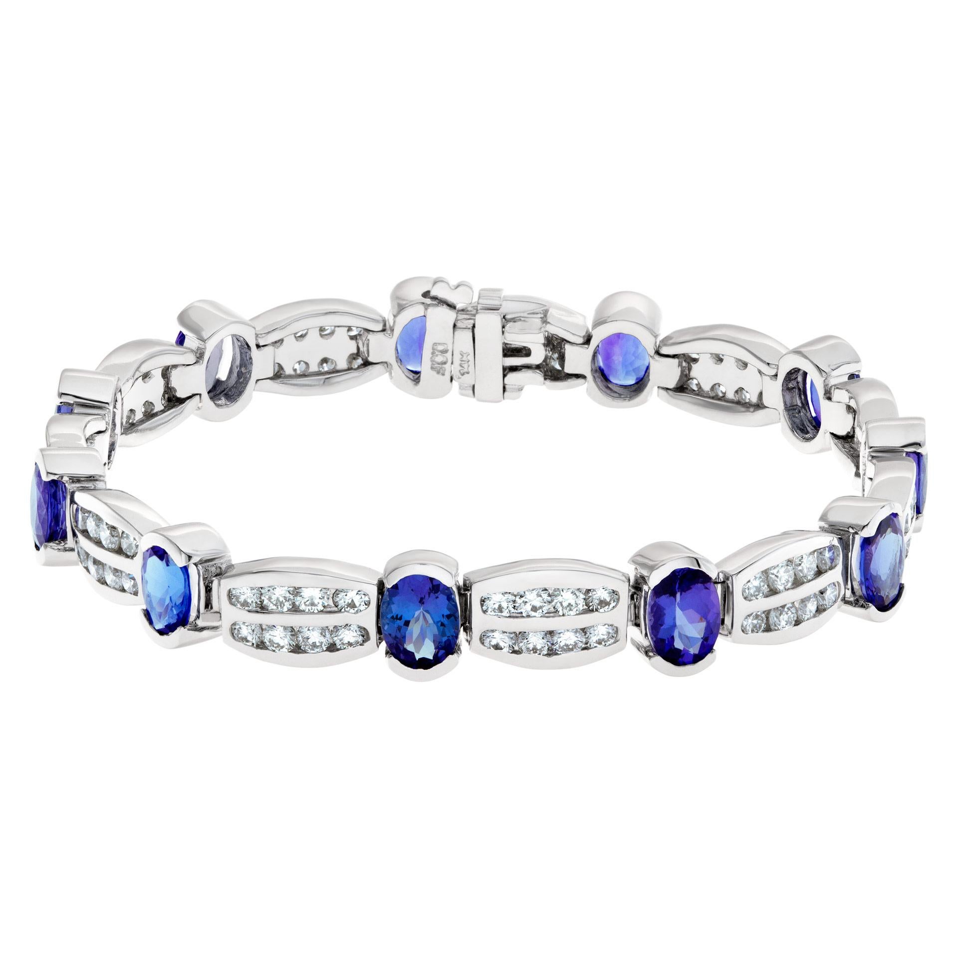 Women's Bracelet in 14k Yellow Gold and 16.8 Cts in Tanzanite and .8 Carats in Diamonds For Sale