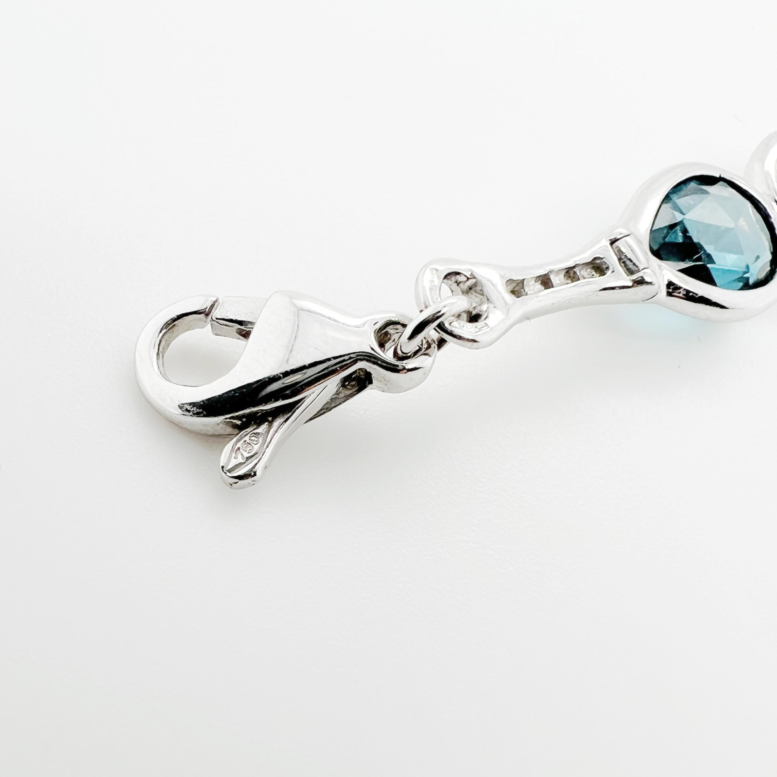 Modern Bracelet in 18k gold with Diamonds and Blue Topaz drops For Sale