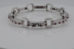 Bracelet in 18K white gold with diamonds and rubys