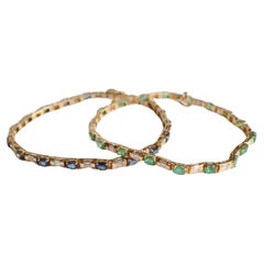 Bracelet in 18k Yellow Gold, 18 Sapphires for 4.02 Kt Emeralds 2.94 Kt Diamonds