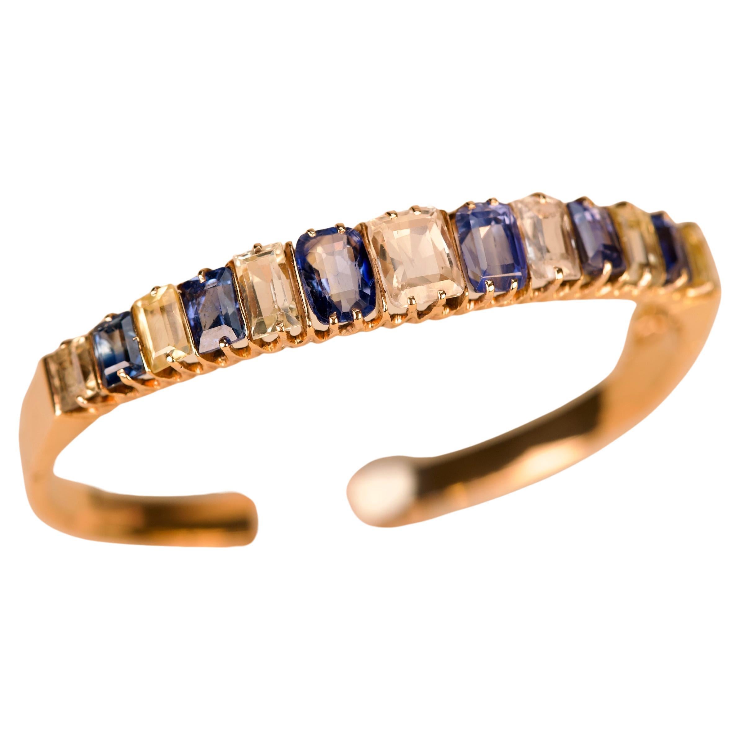 Armband aus Gold, mit blauen und gelben Saphiren