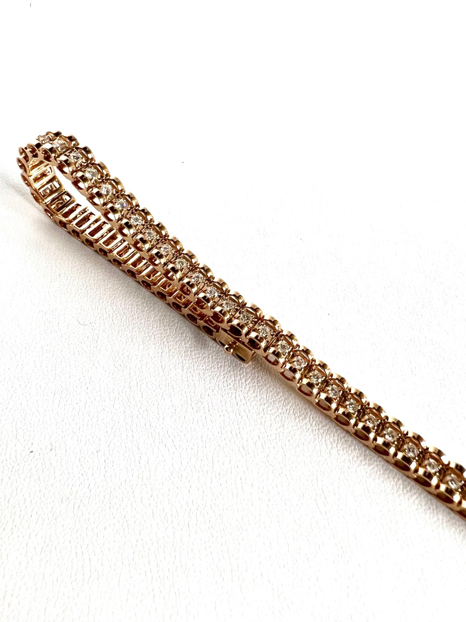 Thomas Leyser is renowned for his contemporary jewellery designs utilizing fine gemstones.

1 flexible bracelet in 14k red gold with 52 diamonds round H/SI, 2,10cts.. Length 19cm. Width 6mm.