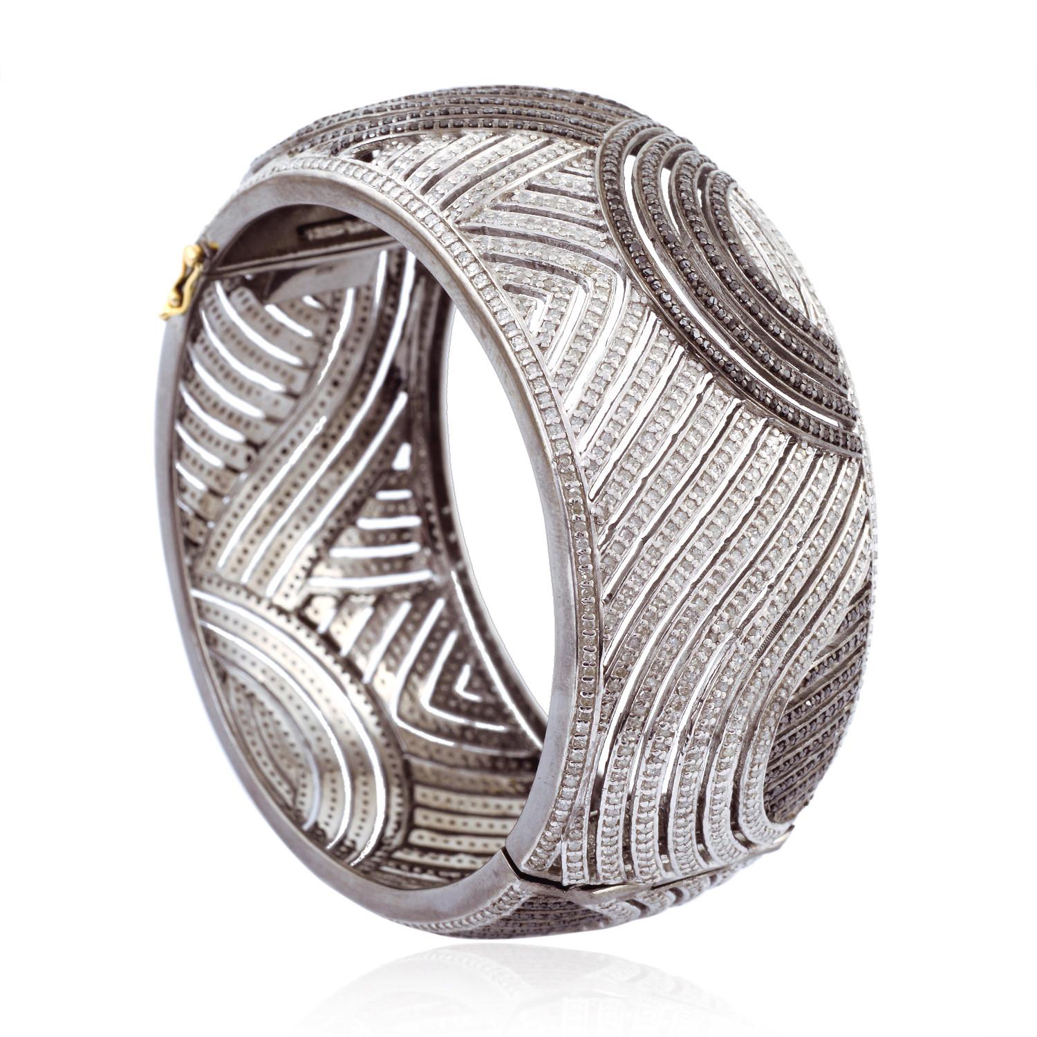 Modern Bracelet in Swirl Design With Black & White Diamonds Made in 18k Gold & Silver For Sale
