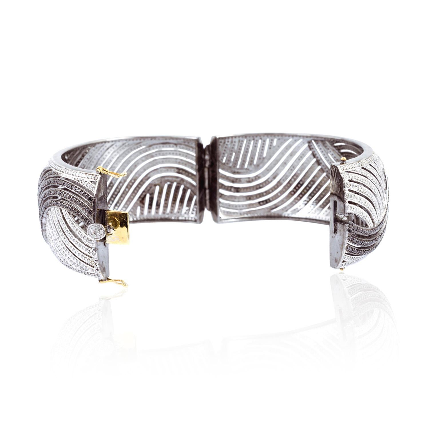 Round Cut Bracelet in Swirl Design With Black & White Diamonds Made in 18k Gold & Silver For Sale