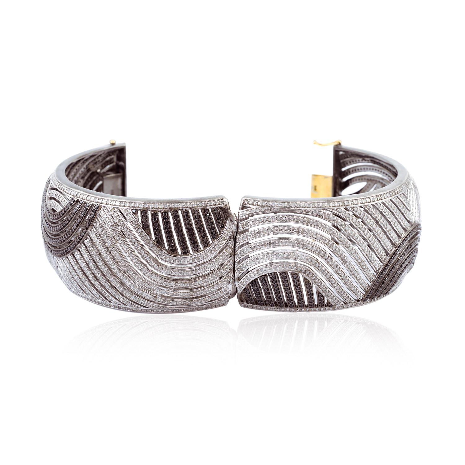 Armband in Wirbeldesign mit schwarzen und weißen Diamanten aus 18 Karat Gold und Silber im Zustand „Neu“ im Angebot in New York, NY
