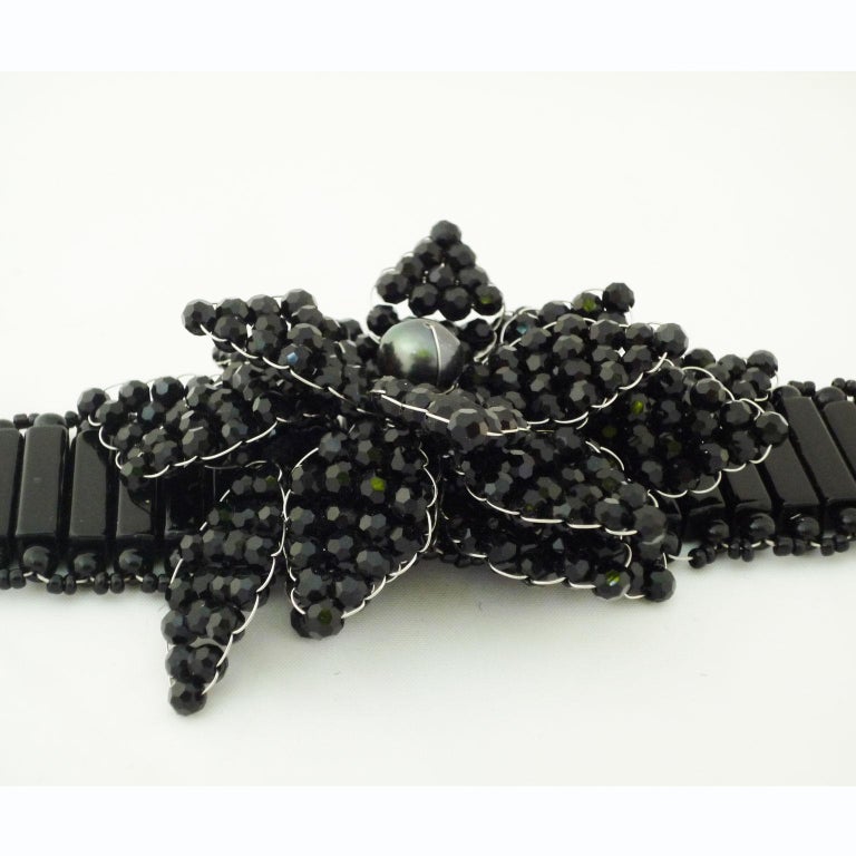 Bracelet made of black limestone and black Swarovski pearls For Sale at  1stDibs | chch bracelet, what are swarovski pearls made of
