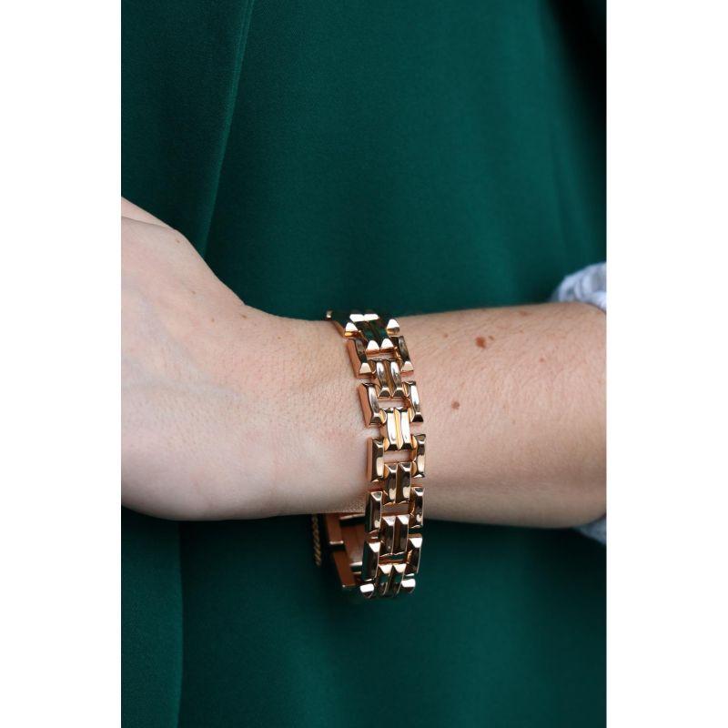 Tank bracelet in rose gold 750 thousandths (18 carats). closure with safety chain. 
length: 18 cm. width: 1.6 cm. thickness: 0.37 cm 
total weight: 39.39 g. owl hallmark. excellent condition.
