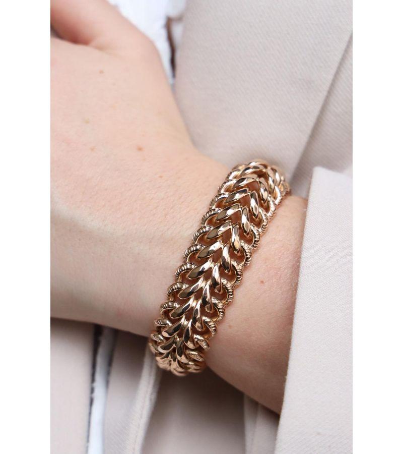 Bracelet American mesh. in pink gold 750 thousandths (18 carats). Wrist size: 17 cm. Width: 2 cm. Total weight: 43.42 g. Eagle head hallmark. Excellent condition
