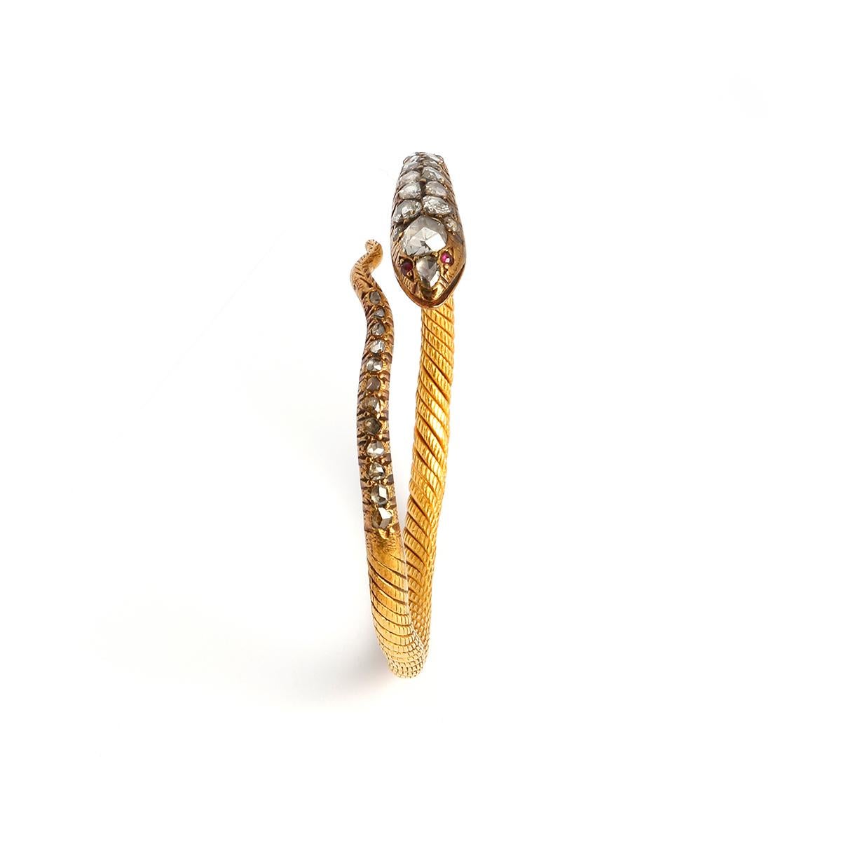 Bracelet Snake set by rose cut diamond. Total 3.50 carats on twisted yellow gold.

Rose cut Diamond size: 0,24x0,28 inch (0.6x0.7 centimeters) height 0,08 inch (0.2 centimeters)
Head's length: 1.57 inch (4.00 centimeters)
Size: 6 1/4 inches (16.00