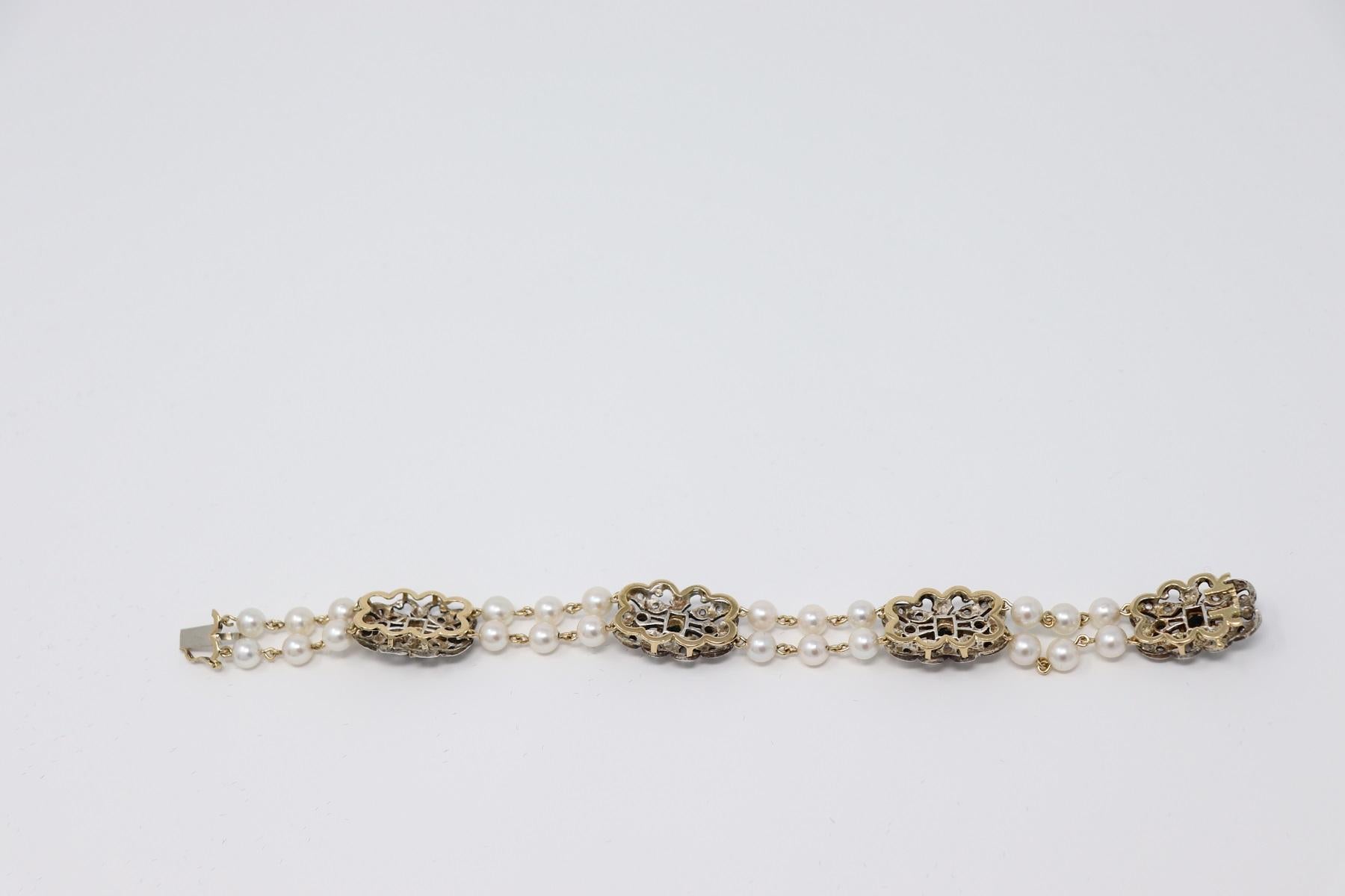 Bracelet Two Strands of Pearl, Gold and Silver, Sapphires and Diamonds, 1980 For Sale 1
