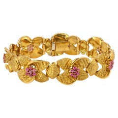 Bracelet vintage fleur en or amati et rubis