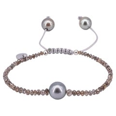 Bracelet with 11ct light brown diamonds, Tahiti pearls and drawstring closure