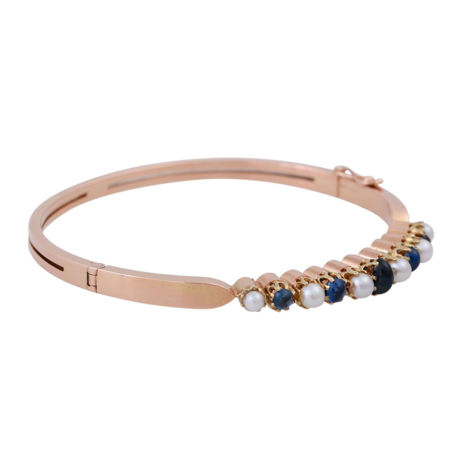 14K rose gold, inner circumference approx. 17 cm, 2nd half of the 20th century, nice condition!

Bangle with 5 cabochon cut sapphires and 6 cultured pearls, RSG 14K, inner circumf. Approx. 17 cm, 2nd half of 20th cent., good condition.
