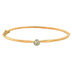 Bracciale con un diamante vecchio taglio europeo fino a 0,80ct in oro bicolore 14k