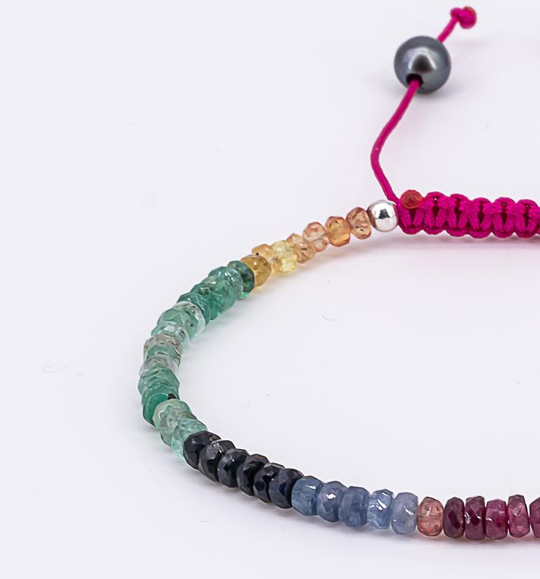 Bead Bracelet with about 18 carat gemstones and drawstring closure For Sale