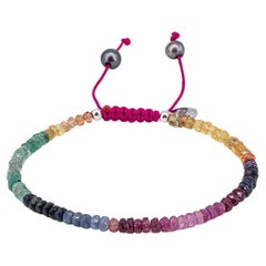 Bracelet with about 18 carat gemstones and drawstring closure