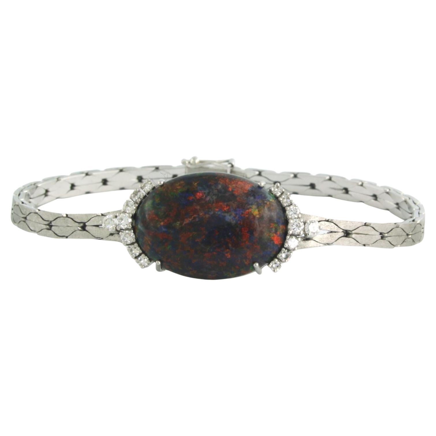 Bracelet with black opal and diamonds 14k white gold