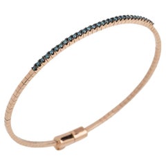 Bracelet artisanal en or rose 18 carats avec diamants bleus brillants