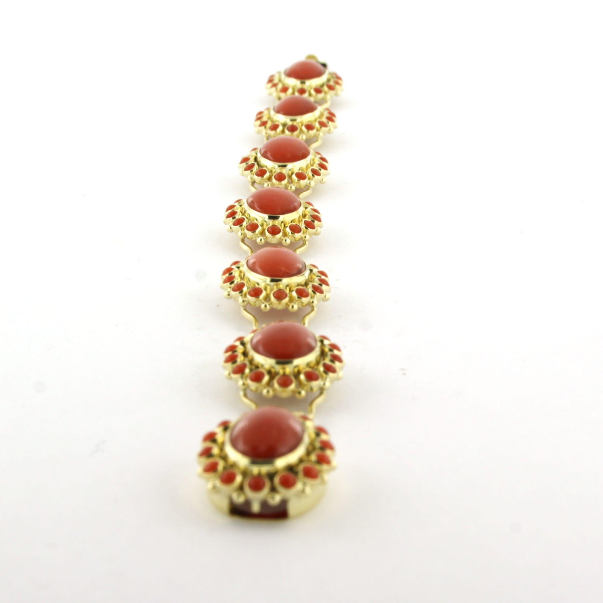 14k yellow gold bracelet set with coral - 20 cm long - 18.6 grams

Detailed description:

The bracelet is approximately 20.0 cm long, 1.4 cm wide, and 6.5 mm high.

Total weight: 18.6 grams

Set with:

- 7 x 1.2 cm x 8.5 mm oval cabachon-cut
