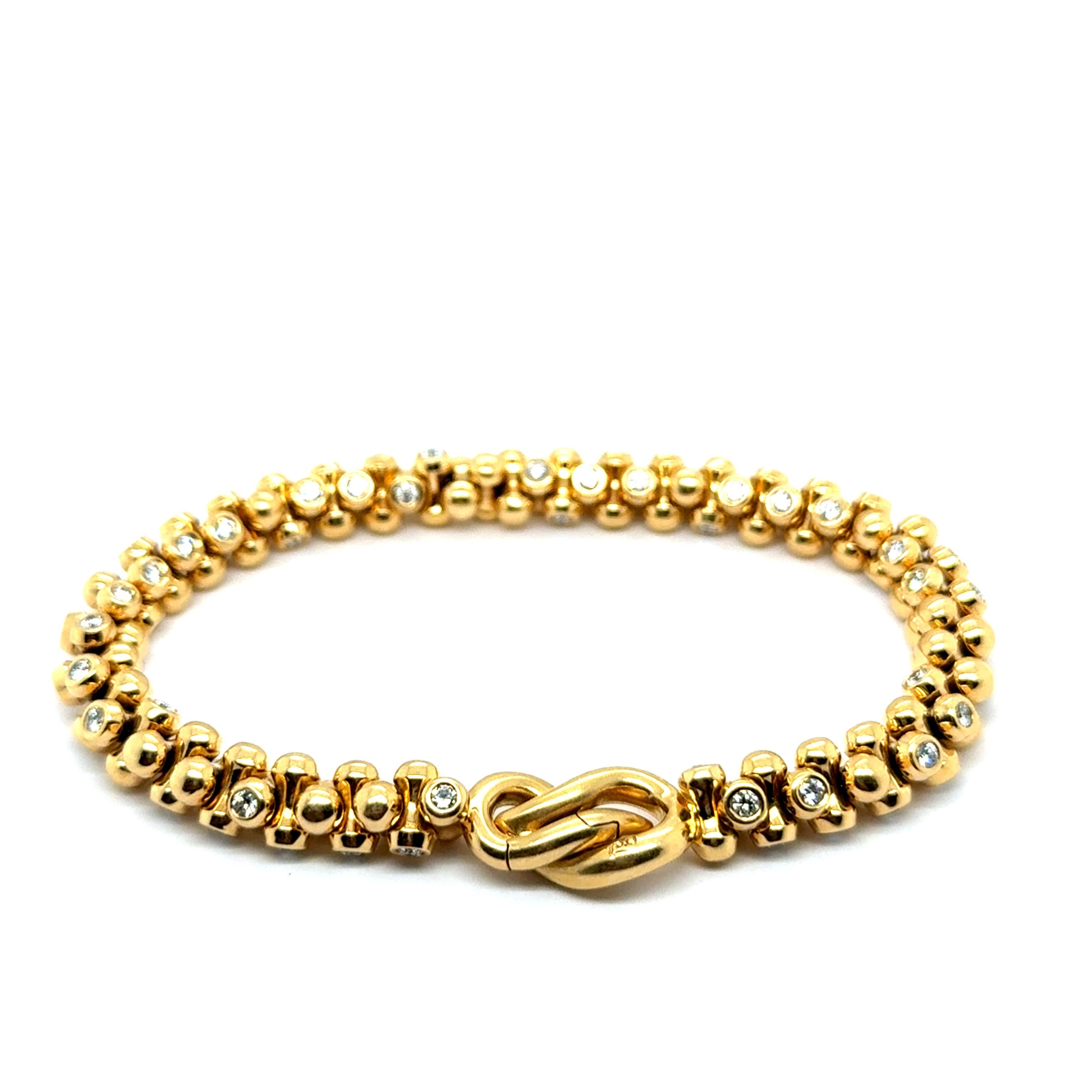 Armband aus 18 Karat Gelbgold mit Diamanten von Tamara Comolli 9