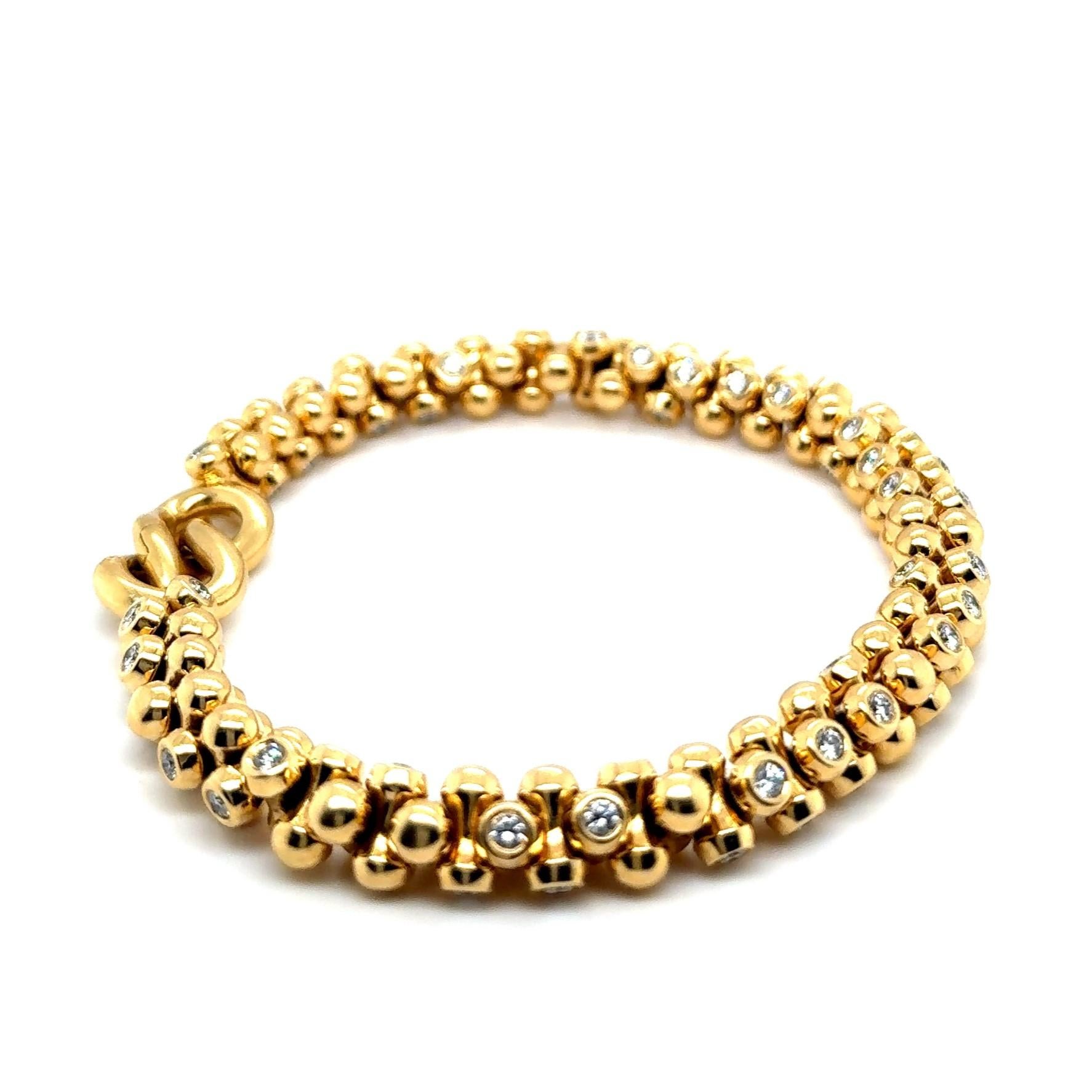 Armband aus 18 Karat Gelbgold mit Diamanten von Tamara Comolli 10
